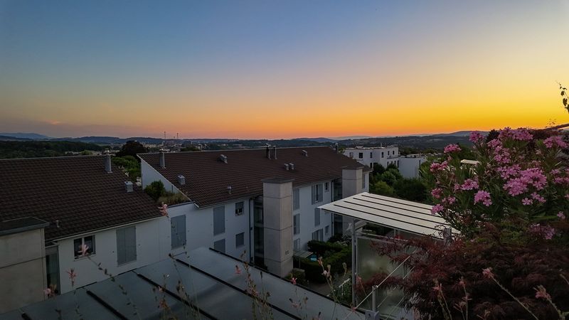 Dachterrasse bei Sonnenuntergang, Attika-Duplexwohnung Asylstrasse 61, Ittigen
